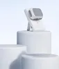 A white wireless charger with a white and gray charging case for earbuds is displayed on white pedestals against a light blue background. Produktbild-Vorschau