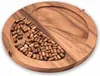 A wooden board game with many small wooden pieces inside a carved-out section. Produktbild-Vorschau