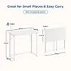 A diagram showing a white folding desk in its open and folded states, with dimensions and weight capacity indicated. Produktbild-Vorschau