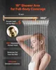 A woman is showering under a large shower head attached to a long shower arm. Podgląd zdjęcia produktu