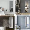 Collage of four images showing a full-length mirror in different room settings. Voir les images du produit
