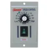 A close-up, front-facing view of a gray speed control device with a black dial and a green switch. Náhľad obrázku produktu