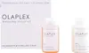 A white box with the Olaplex logo and text, next to two small bottles of Olaplex products. Náhľad obrázku produktu