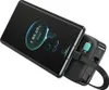 A smartphone is wirelessly charging on a black power bank. Náhled obrázku produktu
