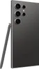 A close-up, angled view of the back of a dark gray Samsung Galaxy S24 Ultra smartphone, with its stylus inserted into a slot on the side. Podgląd zdjęcia produktu