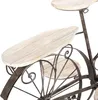 A close-up view of a decorative plant stand shaped like a bicycle, featuring wooden shelves and a metal frame. Produktbild-Vorschau
