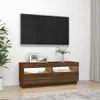 A TV stand with a TV mounted above it in a living room setting. Náhled obrázku produktu