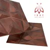 Two 3D wall panels with a geometric design, one in the foreground and one slightly behind it, against a white background. A logo and brand name are visible in the upper right corner. Produktbild-Vorschau