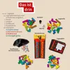 A flat lay of game components including puzzle pieces, cards, a timer, and dice, with descriptive text. Produktbild-Vorschau