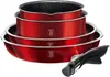 A set of red pots and pans stacked on top of each other, with a black handle detached. Podgląd zdjęcia produktu
