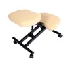 A beige and black kneeling chair with wheels, shown from a diagonal angle on a white background. Náhled obrázku produktu