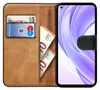 A book-style phone case with slots for cards and cash, shown open with a smartphone inside. Anteprima dell’immagine prodotto