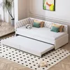 A white daybed with an extended trundle bed is shown in a room with a polka dot rug and a plant in the background. Produktbild-Vorschau