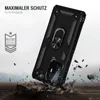 A black phone case with a ring holder is shown falling and impacting the ground, with debris flying. Produktbild-Vorschau