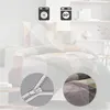 A bed with bedding is shown, with close-up insets of a zipper and fabric detail. Icons indicating washing instructions are also present. Produktbild-Vorschau