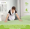 A hotel maid making a bed with green sheets. Produktbild-Vorschau