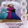 A close-up marketing image of Disney Frozen characters Anna and Elsa on a duvet cover, with accompanying feature icons and descriptive text. Produktbild-Vorschau