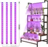 A set of grow lights and a multi-tiered plant stand filled with various plants. Produktbild-Vorschau