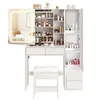 A white vanity table with a lighted mirror and a stool, filled with various cosmetic products. Produktbild-Vorschau