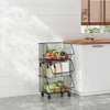 Schwarzer 3-stufiger rollbarer Utility-Wagen gefüllt mit Früchten, Gemüse und Kartons, in einer modernen Küche Náhľad obrázku produktu