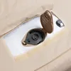 A close-up view of an air pump mechanism integrated into a beige fabric product, possibly a sofa or mattress. Produktbild-Vorschau