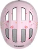 A top-down view of a pink children's bicycle helmet with a princess-themed pattern. Náhled obrázku produktu