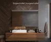 A modern bathroom vanity with a sink and mirror, featuring wooden cabinetry and a concrete wall. Produktbild-Vorschau