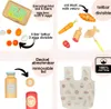 A collage of wooden toy food items and accessories, including an egg box, carrots, croissants, a fish toy, a milk bottle, a jam jar, and a shopping bag. Produktbild-Vorschau