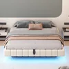 A modern bedroom with a bed as the central focus, illuminated by blue LED lights underneath. Náhľad obrázku produktu
