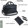A black quilted diaper bag with various features labeled. Produktbild-Vorschau