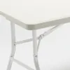 A close-up view of the white folding table's metal legs and frame. Produktbild-Vorschau