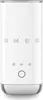 A white Smeg milk frother with a silver base is shown against a white background. Voir les images du produit