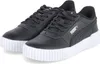 A pair of black Puma Carina 2.0 sneakers with white soles, shown from a slightly elevated side angle against a white background. Podgląd zdjęcia produktu