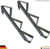Two dark gray metal stair stringers with three steps each, presented on a white background. Produktbild-Vorschau