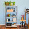 A metal shelving unit filled with kitchenware and plants. Náhled obrázku produktu