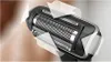 Close-up of a shaver head with arrows indicating movement. Podgląd zdjęcia produktu