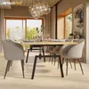 A dining room setting with a table and chairs. Produktbild-Vorschau