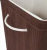 Close-up of the side of a brown bamboo laundry basket with a white rope handle. Produktbild-Vorschau