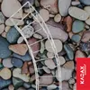 A white garden edging product is placed on a bed of colorful pebbles. Produktbild-Vorschau