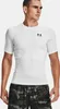 A man wearing a white Under Armour compression shirt and camouflage shorts. Produktbild-Vorschau