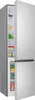 A silver and gray refrigerator with its doors open, showing the interior compartments filled with food items. Podgląd zdjęcia produktu