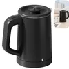 A black electric kettle is shown against a white background. A smaller inset image shows the kettle on a table with a glass of water. Produktbild-Vorschau