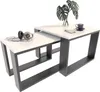A set of two nesting coffee tables with white tops and dark gray frames, displayed on a white background.