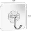 A close-up of a clear adhesive hook with a silver metal hook, displayed against a white background. Dimensions are indicated by text overlays. Produktbild-Vorschau