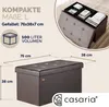 A collage showing a brown storage ottoman with dimensions and capacity information, and a close-up of the ottoman's lid and a tray with books. Anteprima dell’immagine prodotto