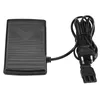 A black sewing machine foot pedal with a cord and plug. Náhľad obrázku produktu
