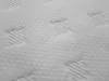 A close-up view of the textured fabric of a mattress or box spring. Produktbild-Vorschau