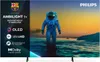 A television screen displaying an astronaut in water with a sunset in the background, with various logos and text overlays on the left side. Produktbild-Vorschau