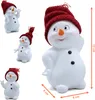 A collage of four decorative snowmen, with one larger snowman prominently displayed on the right. Produktbild-Vorschau