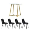 A round dining table with four black chairs. Anteprima dell’immagine prodotto